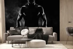 Fototapeta: Umięśniony mężczyzna w rękawicach bokserskich