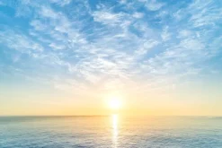 Fototapeta: Wchód słońca nad morzem