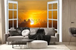 Fototapeta: Widok przez okno na morze i zachód słońca