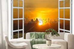 Fototapeta: Widok przez okno na morze i zachód słońca