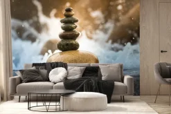 Fototapeta: Wieża z kamieni na tle wody