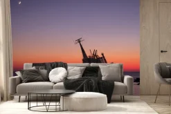 Fototapeta: Wrak statku na morzu przy zachodzie słońca