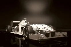 Fototapeta: Wyścigówka formuła 1 na ciemnym tle