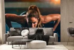 Fototapeta: Wysportowana kobieta robiąca pompki