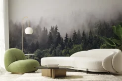 Fototapeta: Zalesione zbocza gór w wysokiej mgle