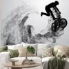 Naklejka: Abstract silhouette of a bmx rider on the white background from