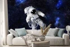 Naklejka: Astronauta pływających w ciemnej przestrzeni.