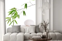 Naklejka: Gałązka bambusa i gładkie białe kamienie