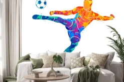 Naklejka: Piłkarz kopiący piłkę