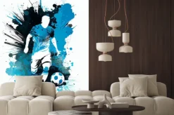 Naklejka: Piłkarz z piłką na tle niebieskich plam ilustracja