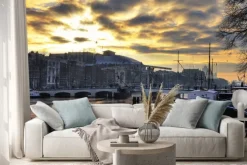 Naklejka: Piękny zimowy panorama rzeki amstel i chudy mostu w amsterdamie,