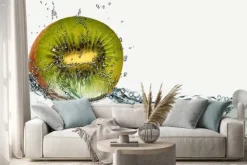 Naklejka: Ripe fruit of kiwi and sparks of water.