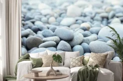 Naklejka: Round stones on a dry river bed outside in nature. smooth pebbles