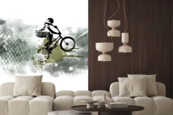Naklejka: Rowerzysta w wyskoku na abstrakcyjnym tle