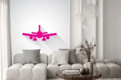 Naklejka: Różowy ikonę samolot internetowej na jasnoszarym tle
