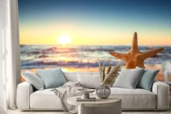 Naklejka: Rozgwiazdy na plaży o wschodzie słońca