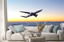 Naklejka: Samolot na niebie o świcie