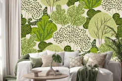 Naklejka: Seamless pattern with green trees in a hand-drawn style on a