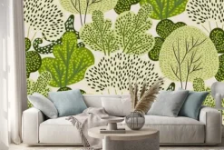 Naklejka: Seamless pattern with green trees in a hand-drawn style on a