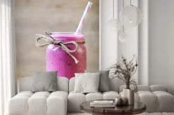 Naklejka: Smoothie, różowy sok na szarym tle.