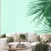 Naklejka: Summer composition. palm leaves on mint background. summer concept.