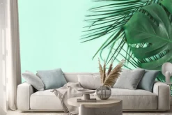 Naklejka: Summer composition. palm leaves on mint background. summer concept.