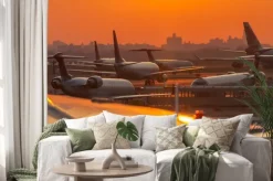 Naklejka: Sunset at the airport with airplanes ready to take off