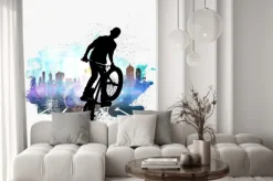 Naklejka: Sylwetka rowerzysty na tle nowoczesnego miasta
