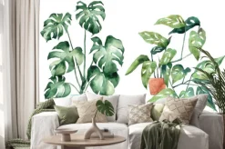 Naklejka: Watercolor image with tropical leaves and leaves of indoor plants.