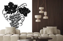 Naklejka: Winogrona z liśćmi na gałęzi na białym tle.