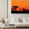 Obraz: Afrykański krajobraz z lwa zwierząt sylwetki. savanna tle zachodu