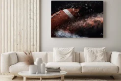 Obraz: American football ball close up on black background.