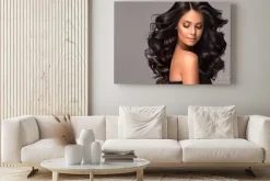 Obraz: Beauty brunette girl with long and shiny wavy black hair .