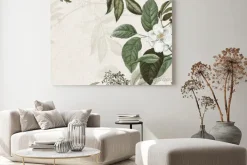 Obraz: Biały kwiat wśród zielonych liści