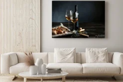 Obraz: Dinner concept for two. two glasses of white wine, baked fish.