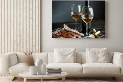 Obraz: Dinner concept for two. two glasses of white wine, baked fish.