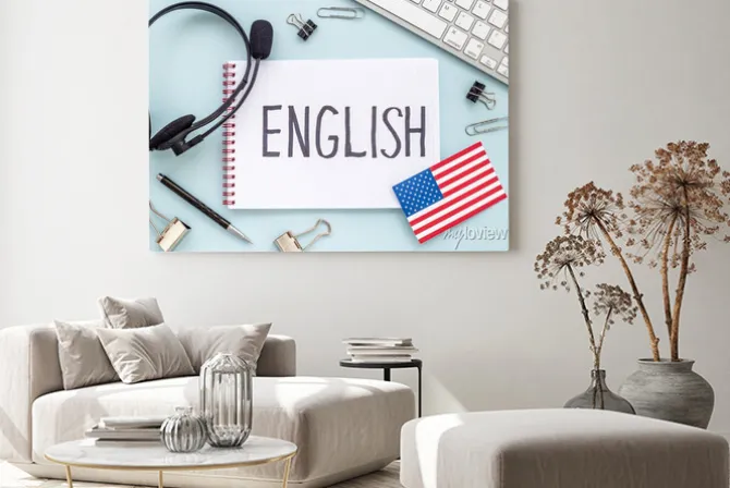 Obraz: English lessons concept. headpones with notebook on student table