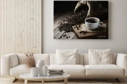 Obraz: Filiżanki kawy i ziarna kawy na drewnianym stole