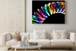 Obraz: Grzywny 3d obraz metalowej sprężyny tle tęczy