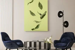 Obraz: Levitating laurel leaves on a green background