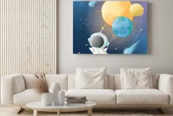 Obraz: Little astronaut flying with planet baloons