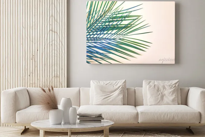 Obraz: Tropikalne liście na pastelowe różowe tło.