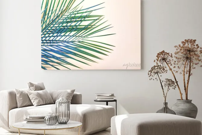 Obraz: Tropikalne liście na pastelowe różowe tło.