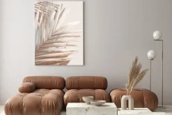 Obraz: Tropikalne liście palmowe na beżowym tle