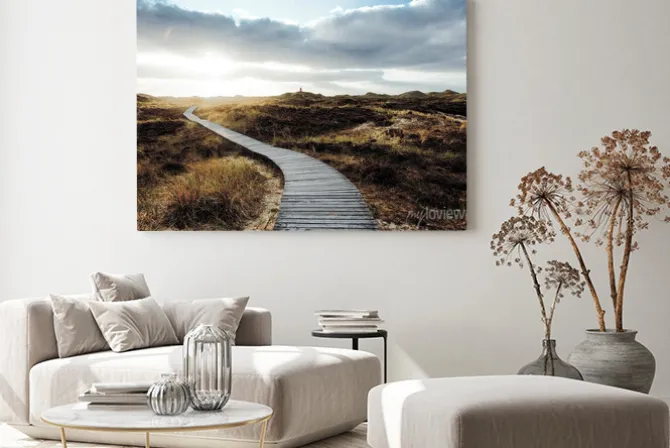 Obraz: Wooden footpath to lighthouse winding among heaps of coastal