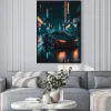 Plakat: A car driving down a city street at night, cyberpunk, futuristic