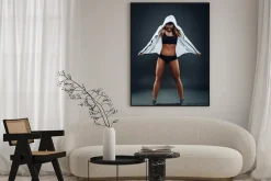 Plakat: Attractive athletic young woman posing in studio on dark backgro