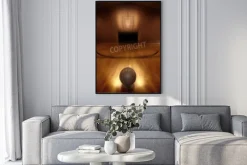 Plakat: Basketball on floor of empty basketball court