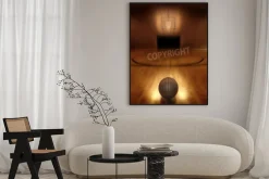 Plakat: Basketball on floor of empty basketball court