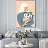 Plakat: Beauty woman with blond hair holding a bouquet of spring flowers.